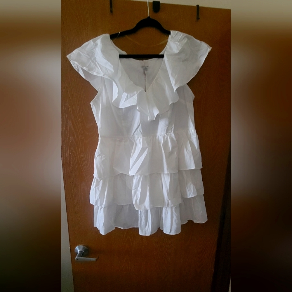 White sleeveless ruffle dress